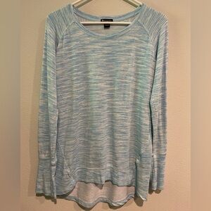 Champion light blue and white high low hem long sleeve shirt.  Size M